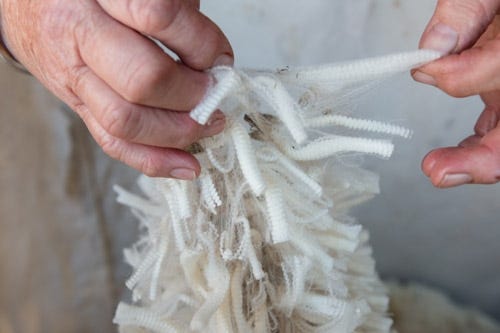 How Do You Process Raw Wool Into Mattresses?